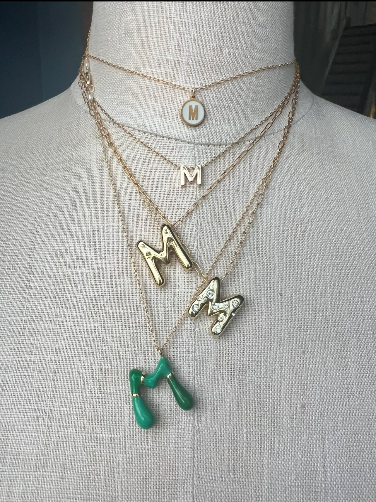 green initial pendant